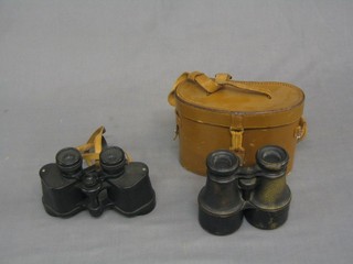 A pair of brass candlesticks, a Benares brass bowl, 2 pairs of binoculars and an aneroid barometer etc