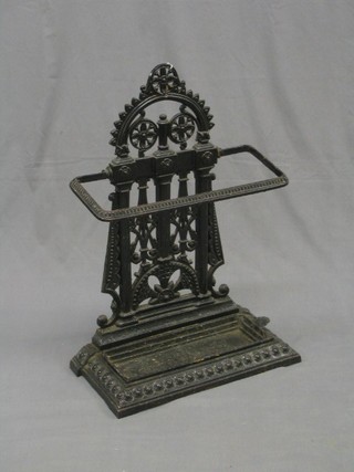 A Victorian pierced cast iron umbrella stand 21" (damage to handle of drip tray)