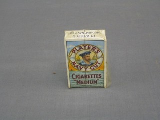 A packet of Player's cigarette cards, unopened