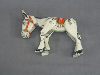 A pressed metal Muffin The Mule puppet