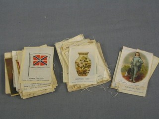 A collection of various Kensitas silk cigarette cards