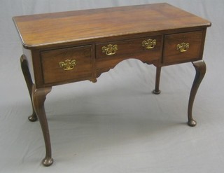 A Georgian mahogany side table fitted 1 long and 2 short drawers with brass drop handles, raised on cabriole supports 48"