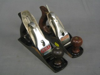 A Stanley No. 4 smoothing plane together with an RSI No. 4 smoothing plane