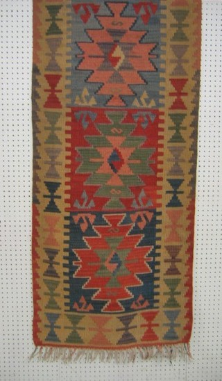 A contemporary Kelim runner with all over geometric design 76" x 24"