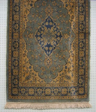 A blue ground Persian style rug 57" x 36"