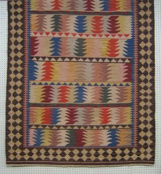 A contemporary Kelim rug with all over geometric design 68"  x 48"