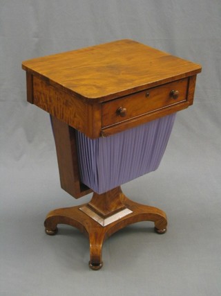 A William IV bleached mahogany work table fitted a drawer with purple plaited basket, raised on a triform base 28"