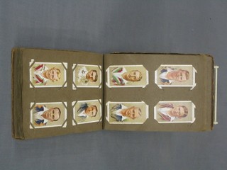 An album of various cigarette cards including footballers, soldiers, cricketers, etc