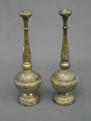 A pair of Eastern embossed metal rosewater sprinklers