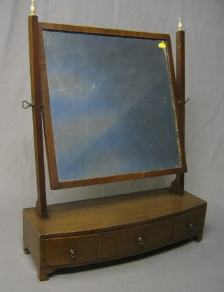 A 19th Century rectangular plate dressing table mirror raised on a mahogany stand with bow front base fitted 1 long and 2 short drawers, raised on bracket feet 24"