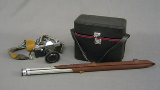 A Pratika Super AL2 camera complete with various lenses, tripod and carrying case