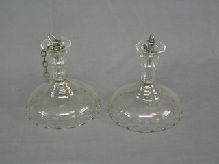 A pair of cut glass light fittings