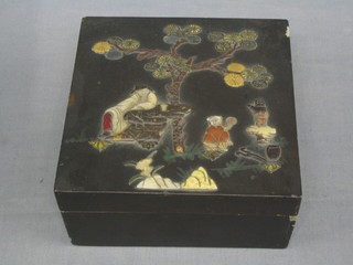 A fine quality Oriental lacquered trinket box, the lid inlaid mother of pearl and other semi-precious stones in the form of a seated gentleman beneath a tree with child 8"
