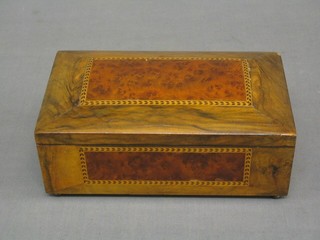 A figured walnut cigarette box with hinged lid 9"