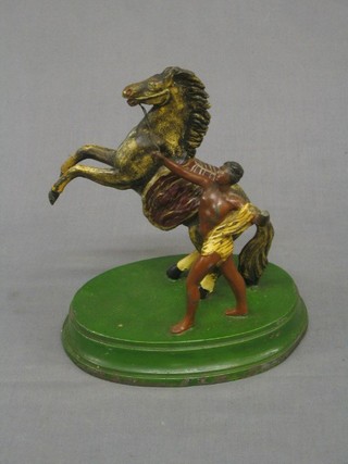 A spelter figure of a Marley  horse (f) 9" and a spelter figure of a warrior 8"