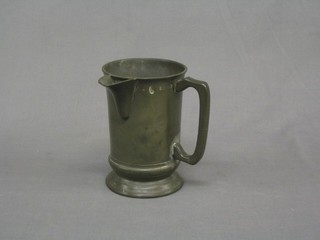 A Victorian pewter quart spouted measure, the base with  engraving