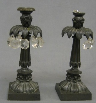 A pair of 19th Century bronze candlesticks with lustre decoration 11"