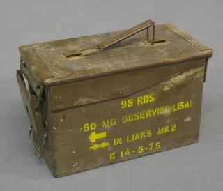A metal ammunition box dated 14.5.75