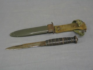 An American Vietnam period single edge combat knife, scabbard marked US18A1