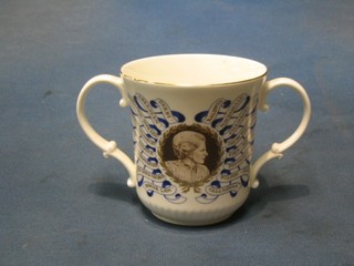 A 1979 Royal Doulton twin handled commemorative cup to commemorate The Right Honourable Margaret Thatcher, First Woman Prime Minister