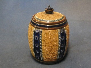 A Doulton Lambeth cylindrical tobacco jar and cover, base marked Doulton Lambeth 80 94, 5" (chip to inside of lid)