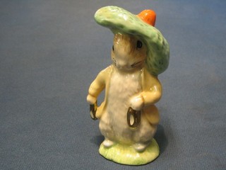 A Beswick Beatrix Potter figure "Benjamin Bunny" the base with gold stamp mark dated 1997