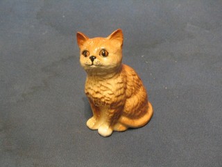 A Royal Doulton figure of a seated ginger cat