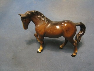 A Beswick figure of a bay horse with right hoof crooked, 6" (1 ear f and r)