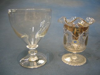 A 19th Century Continental hand blown vase with wavy border, raised on a circular spreading foot, (chip to rim) and a glass rummer