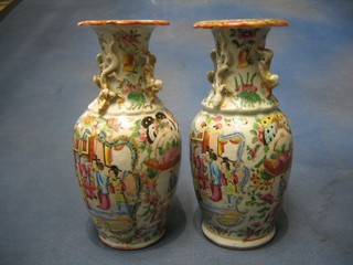 A pair of 19th Century famille rose Canton porcelain club shaped vases decorated court figures 9" (1 f and r)