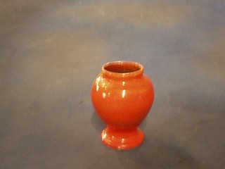 A Brenan orange glazed pottery vase, base marked T H Brenan  Devon, Made in England 5"