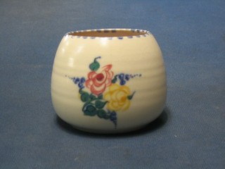A circular Poole Pottery jar/vase with floral decoration, the base with impressed Poole mark and incised 288 3"