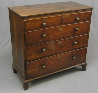 A Georgian oak chest of 2 short and 3 long drawers raised on bracket feet 45"