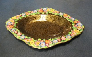 A Tuscan china oval shaped dish with gilt ground and floral edge 10"