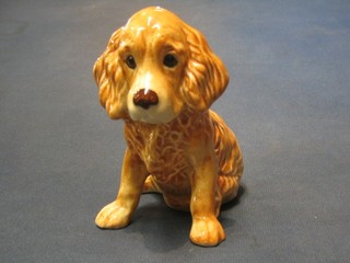 A Sylvac figure of a seated "Spaniel", base marked 18 Sylvac Made in England, 4"
