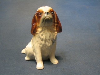A Sylvac figure of a seated dog, base marked A197 5"