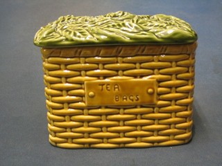 A rectangular Sylvac pottery biscuit barrel in the form of a basket, base marked 5038 6"