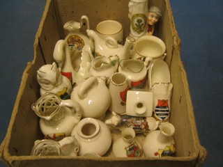 22 various items of crested china