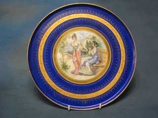 A circular Berlin porcelain plaque decorated 2 classical ladies, 12"