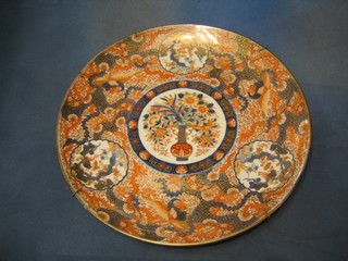 A large and impressive 19th Century Japanese Imari porcelain charger, the reverse with 3 character mark 18 1/2" (slight chip to rim)