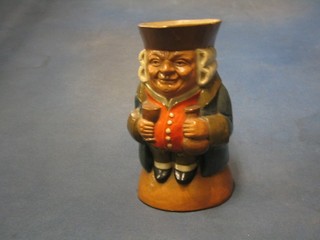 A Royal Doulton pottery Toby jug in the form of Toby Philpot with glass and decanter, base marked Royal Doulton Lambeth England 5872 7"