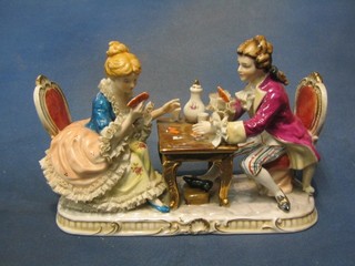 A 20th Century Continental porcelain figure group The Card Game, 11"