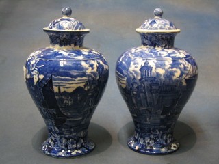 A pair of Wedgwood Flo Bleu pottery vases and covers 9"