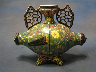 A Victorian pottery oval shaped vase with pierced handles and floral decoration throughout, 9" (f and r)