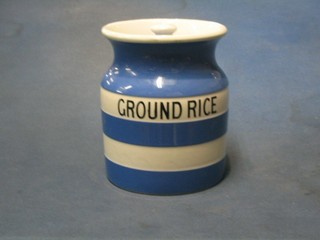 A circular blue and white striped T G Greener Cornish Kitchen ware storage jar marked Ground Rice, the base with black shield mark (some crazing to the lid)