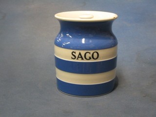 A circular blue and white striped T G Greener Cornish Kitchen ware storage jar marked Sago, the base with black shield mark (chip to rim)