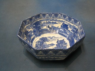 A Cauldon octagonal blue and white pottery plate decorated mythical scenes 9" (cracked)
