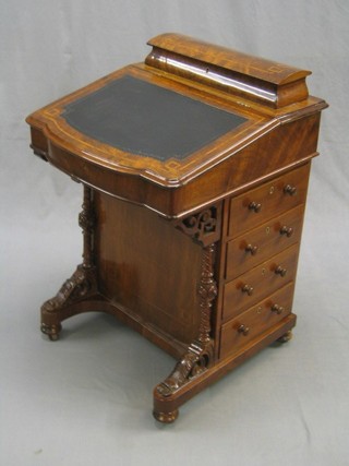 A Victorian inlaid figured walnutwood Davenport desk with hinged lid and stationery box, the pedestal fitted 4 drawers 21"