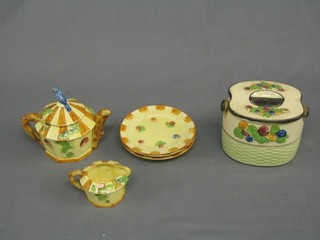A collection of decorative ceramics including a biscuit barrel etc