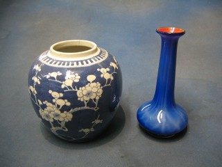 A blue glass club shaped vase 8" and a ginger jar (no cover)